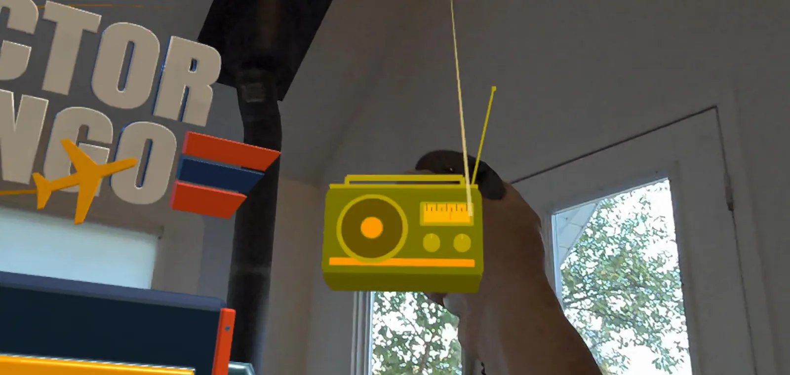 Holding the in-game radio in a real living room